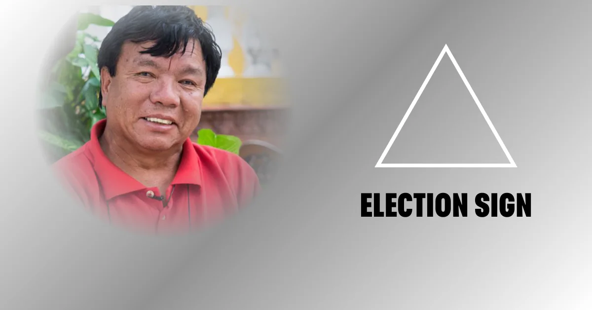 Mahabir Pun receiving the triangle election symbol after filing nomination for HoR Election 2082 in Myagdi